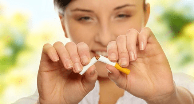 the girl breaks a cigarette and gets rid of addiction